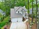 Charming two-story home with a two-car garage and beautiful landscaping at 102 Windrock Lane, Cary, NC 27518