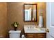 Elegant half bathroom features a decorative mirror, marble countertop, and stylish wallpaper at 102 Windrock Lane, Cary, NC 27518