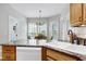 Charming breakfast nook with light-filled dining area located just off of the kitchen at 102 Windrock Lane, Cary, NC 27518