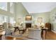 Cozy living room with a fireplace and comfortable seating at 102 Windrock Lane, Cary, NC 27518