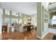 Spacious living room with hardwood floors and plenty of natural light at 102 Windrock Lane, Cary, NC 27518