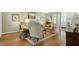 Inviting living room featuring a cozy fireplace, plush seating, and warm lighting for relaxed living at 102 Windrock Lane, Cary, NC 27518