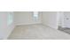 Spacious bedroom featuring neutral walls, carpet flooring, and bright window at 1020 Kentlands Dr, Durham, NC 27713