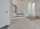 Inviting foyer with a staircase, closet and convenient half bathroom at 1020 Kentlands Dr, Durham, NC 27713