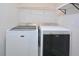 Laundry room features a large, front load washer and dryer at 1020 Kentlands Dr, Durham, NC 27713