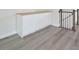 Bright living area features modern cabinets and wood-look flooring at 1020 Kentlands Dr, Durham, NC 27713