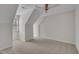 A room featuring carpeted floors and interesting architectural details at 103 Temple Gate Dr, Cary, NC 27518