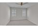 A spacious bedroom featuring a ceiling fan and carpeted floors at 103 Temple Gate Dr, Cary, NC 27518