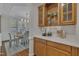 Dining room with wood floors, a decorative built-in cabinet, and white countertops at 103 Temple Gate Dr, Cary, NC 27518