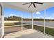 Enclosed back porch with view of the yard at 105 Blooms Way, Kenly, NC 27542