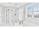 Bathroom features marble tile and glass door shower at 105 Blooms Way, Kenly, NC 27542