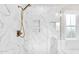 Spacious shower area with bronze shower head and marble tiling at 105 Blooms Way, Kenly, NC 27542