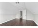 Spacious bonus room boasts hardwood floors, neutral paint, and ample natural light at 105 Blooms Way, Kenly, NC 27542