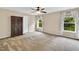 Bright bedroom with a large closet and windows dressed with sheer curtains at 105 Ryder Cup Cir, Raleigh, NC 27603