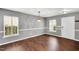 Dining room with hardwood floors, neutral walls, and ample natural light at 105 Ryder Cup Cir, Raleigh, NC 27603