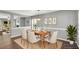 Cozy dining room featuring a wooden table with seating for four guests at 105 Ryder Cup Cir, Raleigh, NC 27603