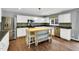 Well-equipped kitchen with stainless appliances and center island for extra counter space at 105 Ryder Cup Cir, Raleigh, NC 27603