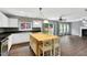 Open kitchen with island, stainless appliances and view of living room and backyard at 105 Ryder Cup Cir, Raleigh, NC 27603