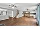 Open floor plan with wood floors and a staircase leading to the second floor at 105 Ryder Cup Cir, Raleigh, NC 27603