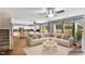 Open concept living room with an eat-in kitchen and cozy furnishings at 105 Ryder Cup Cir, Raleigh, NC 27603