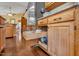Kitchen features wood cabinets, granite counters and a pull out storage drawer at 1100 Queensbury Cir, Durham, NC 27713