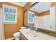 Bathroom with an oversized mirror, a single sink, and a combined shower and tub at 117 Vicksburg Dr, Cary, NC 27513