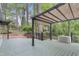 Wide angle view of deck showing pergola and brick patio at 117 Vicksburg Dr, Cary, NC 27513