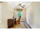 Small office space with a desk, chair, decorative rug and a window with tree views at 117 Vicksburg Dr, Cary, NC 27513