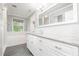 Bright bathroom with granite countertop, modern fixtures, and tile flooring at 1208 Lexington Farm Rd, Apex, NC 27502