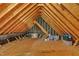 Unfinished attic space featuring exposed beams, storage and HVAC ductwork for a customizable area at 124 Mantle Dr, Clayton, NC 27527