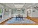Elegant dining room with coffered ceiling and chandelier at 124 Mantle Dr, Clayton, NC 27527