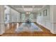 Formal dining room with elegant wainscoting and lots of light at 124 Mantle Dr, Clayton, NC 27527