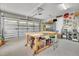 Spacious garage with storage and workbench at 124 Mantle Dr, Clayton, NC 27527