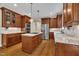 Open kitchen featuring granite countertops, stainless steel appliances, and custom cabinets at 124 Mantle Dr, Clayton, NC 27527