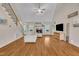 Spacious living room featuring a fireplace, hardwood floors, and vaulted ceiling at 124 Mantle Dr, Clayton, NC 27527