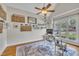 Cozy office with natural light and ceiling fan at 124 Mantle Dr, Clayton, NC 27527