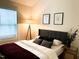 Inviting bedroom with a large window and a cozy, comfortable ambiance at 1310 Pender St, Raleigh, NC 27610