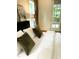 Cozy bedroom featuring a plush bed with a serene view of the outdoor scenery at 1310 Pender St, Raleigh, NC 27610
