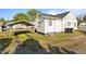 The exterior of the property features an attached carport and white siding at 1329 Mebane St, Burlington, NC 27217