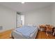 Cozy bedroom featuring hardwood floors, natural light, and neutral walls at 1329 Mebane St, Burlington, NC 27217