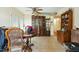 Spacious dining room featuring a display cabinet, dining table, and linoleum floors at 133 Montree Ln, Graham, NC 27253