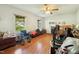 Cozy living room with natural light, a fireplace, and ample space for furniture at 133 Montree Ln, Graham, NC 27253