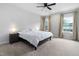 Bright bedroom with neutral walls, plush carpet, and two windows at 139 Callowhill Ln, Durham, NC 27713