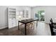 Bright dining room with modern light fixture and seating for four at 139 Callowhill Ln, Durham, NC 27713