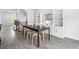 Dining area with modern table, chairs, and stylish built-in shelving at 139 Callowhill Ln, Durham, NC 27713