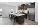 Kitchen featuring an island with sink and bar seating at 139 Callowhill Ln, Durham, NC 27713