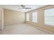 An additional bedroom features neutral walls, carpeted flooring, and ample lighting at 140 Cedar Elm Rd, Durham, NC 27713