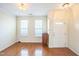 Bright entryway with hardwood floors and natural light from large windows at 140 Cedar Elm Rd, Durham, NC 27713