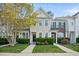 Charming townhome with well-maintained landscaping and classic architectural details at 140 Cedar Elm Rd, Durham, NC 27713