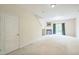 Spacious living room with ample space for furniture and a fireplace for cozy evenings at 140 Cedar Elm Rd, Durham, NC 27713